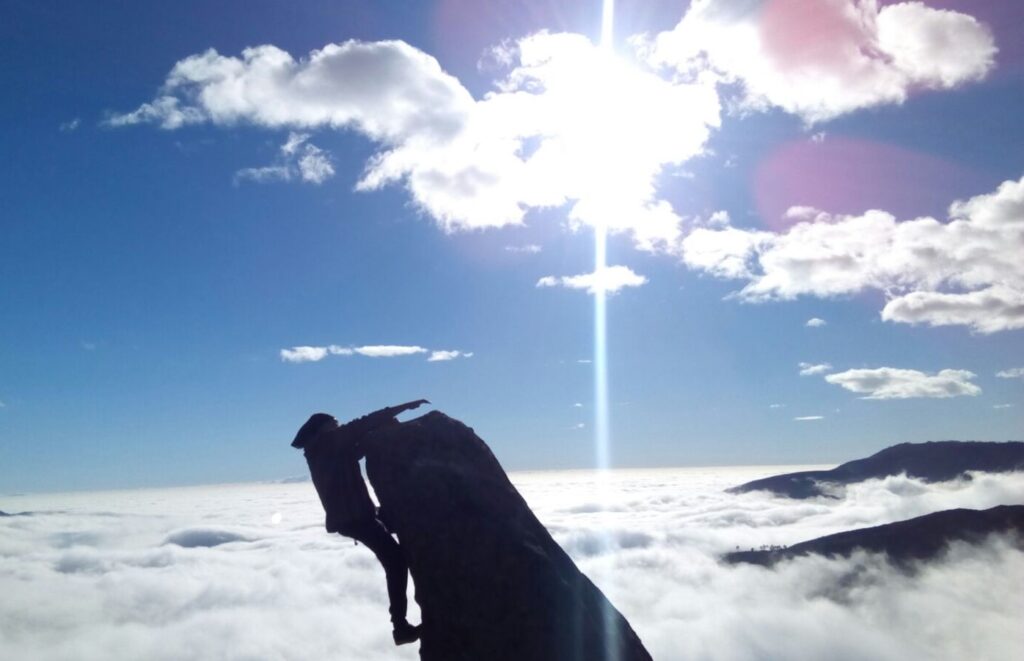 Yo en pico alto de montaña